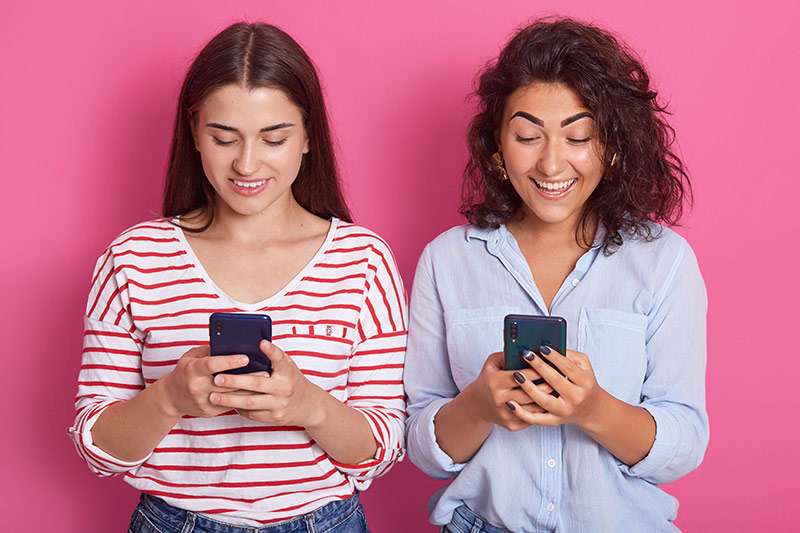 Cute Women With Their Phones
